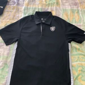 Nike dri-fit black Raiders polo, size small. Light gray stripes on the side